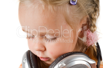 Little girl with headphones