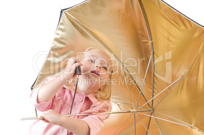 Little girl talking on the phone