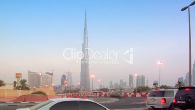 time lapse traffic becoming night at Burj Khalifa