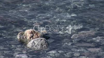 Rocks peaking above surface