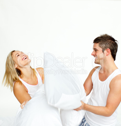 couple having a pillow fight