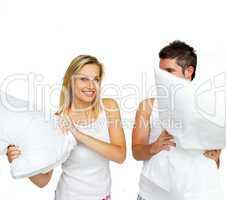 couple having a pillow fight