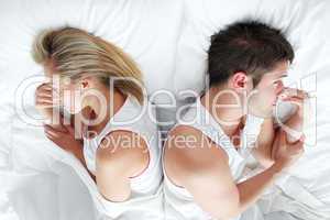 Couple lying in bed