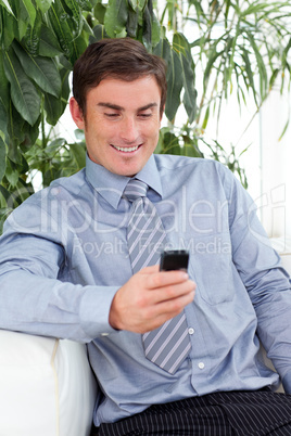 businessman sending a text