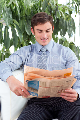 businessman reading a newspaper
