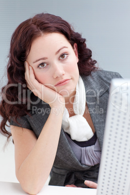 businesswoman in front of a computer