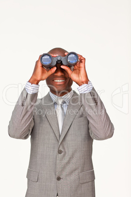 businessman looking through binoculars