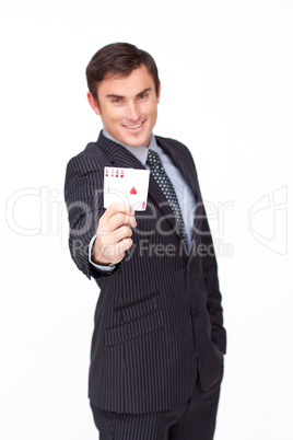 Attractive businessman holding four aces