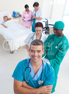 High angle of medical team attending to a child