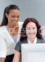 Beautiful businesswomen working together in office