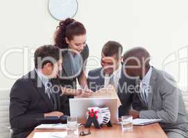 Businessmen in a meeting talking to a secretary