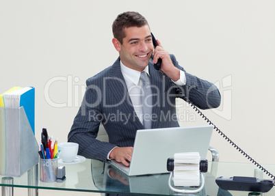 Manager on phone in his office