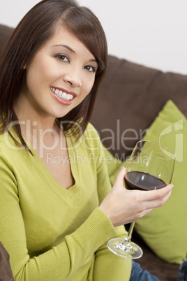 Oriental Woman Drinking Wine