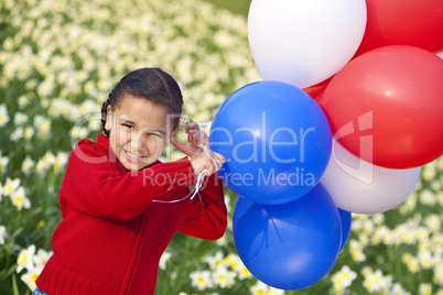 Beautiful Little Girl Playing With Balloons
