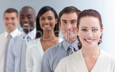 Business team in a line. Focus on a beautiful woman