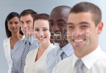 Business people in a line. Focus on an attractive woman