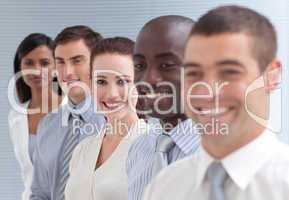 Business people in a line. Focus on an attractive woman