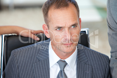 Portrait of a thoughtful male manager in office