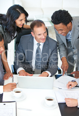 Manager and workers discussing in office a business plan