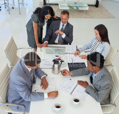 High angle of business people working in a meeting