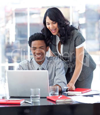 Businesswoman helping her colleague in office