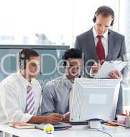 Manager and businessmen working in call center