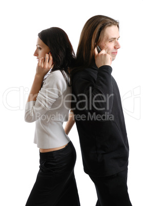 Young couple talking by phone