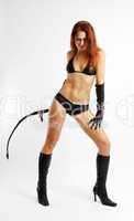 Seminude girl with whip