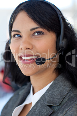 Portrait of a businesswoman talking on a headset