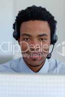 Portrait of Afro-American businessman in a call center