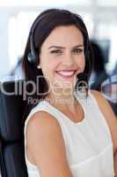 Portrait of attractive businesswoman in a call centre