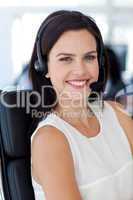 Portrait of a smiling businesswoman in a call centre