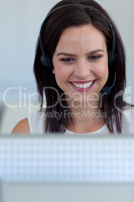 Beautiful businesswoman in a call centre