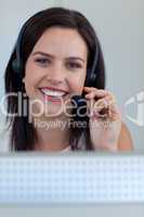 Portrait of a beautiful businesswoman in a call centre