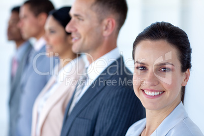 Beautiful businesswoman with her team in a line