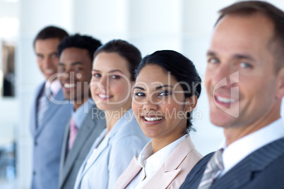 Beautiful businesswoman with her team in a line