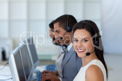 Smiling businesswoman in a call canter
