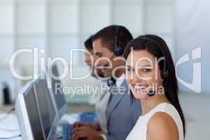 Smiling businesswoman in a call canter
