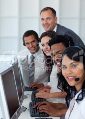 Business team and manager working in a call center