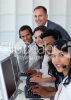Business team and manager working in a call center