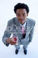 Afro-American businessman holding a glass of wine
