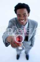 Afro-American businessman celebrating a success with wine