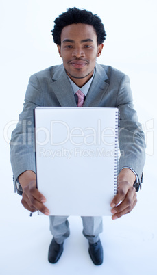 Businessman holding a big notebook