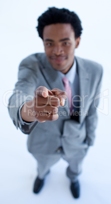 Afro-American businessman pointing at the camera