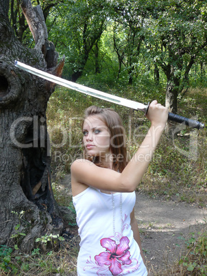 brown-haired woman learns to boss a sword