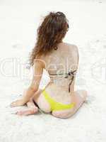 girl sits on beaches