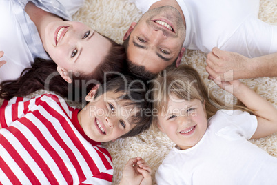 Family on floor with heads together