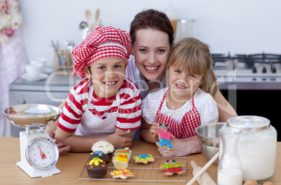 Woman and children baking in the kitchen