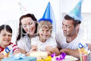 Young family celebrating a birthday