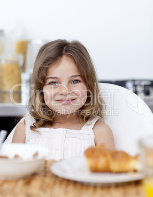 Little girl having breakfast